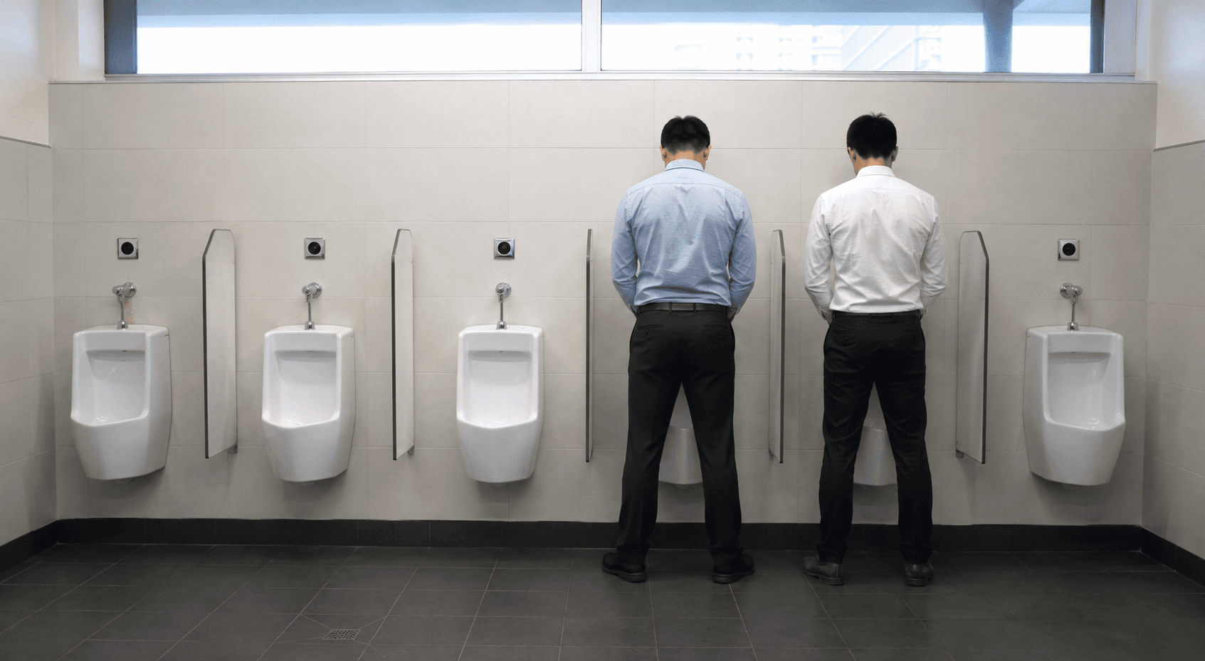 Man Breaks Bro Code By Standing Next To Another In Toilet